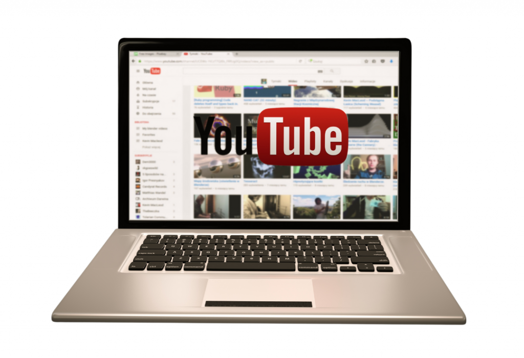 laptop with YouTube on the screen