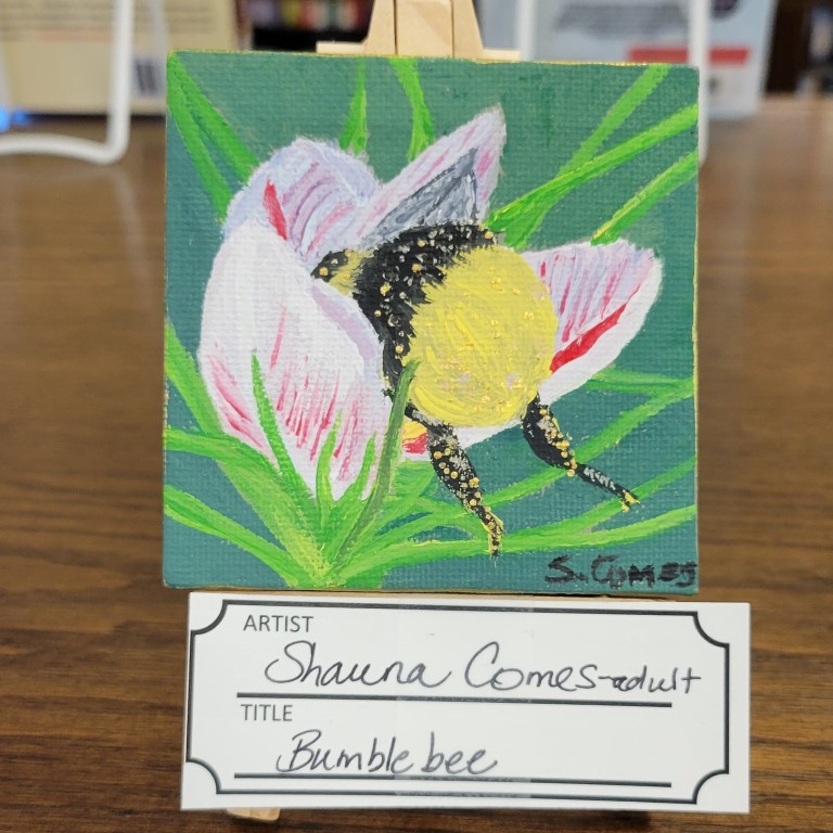 painting with green background with pink, purple and red flower and green leaves or grass with black and yellow bumblebee bottom and legs sticking out of the flower