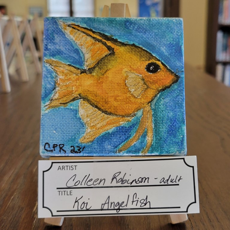 painting with blue background with orange fish