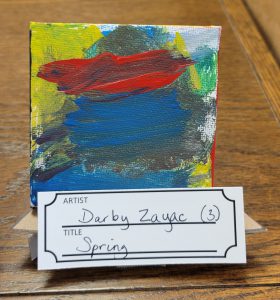 painting with strokes of red, blue, grey, green and yellow