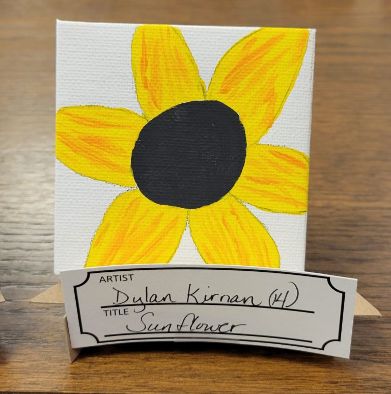 painting of yellow flower with black center