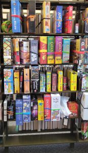 metal shelves with board games