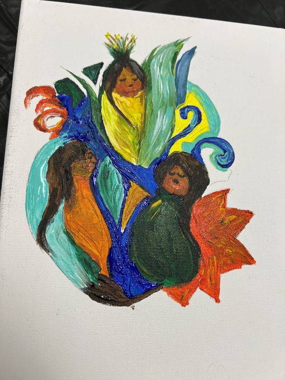 painting with white background with colorful interpretation of Native American "three sisters" plants of corn, green squash, and orange green bean with teal and blue swirls and red squiggle and pointed star shape