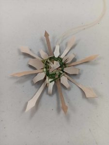 star or snowflake shaped ornament woven with sweetgrass and black ash splint