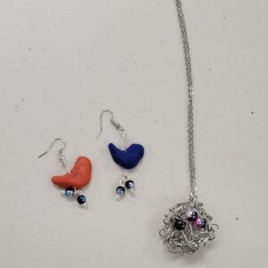 orange and blue clay bird earrings and silver wire bird nest pendant with dark pearly beads