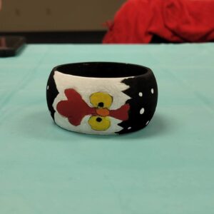 black and white bangle with chicken face