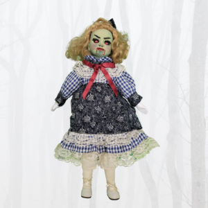 doll with green zombie face and red eyes