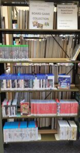 metal shelves with video game cases