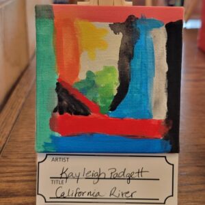 Abstract painting on a small canvas featuring bold colors and shapes.