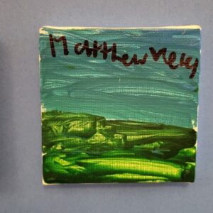 A small canvas with a blue sky and green landscape with artist signature