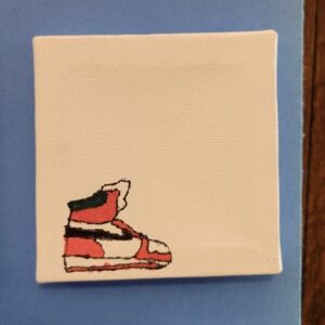 Small canvas with a stylized sneaker drawing in the lower left corner, set on a blue background.