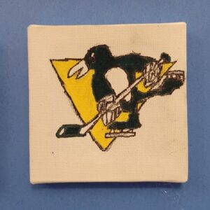 A penguin holding a hockey stick on a yellow triangle background on a square canvas.