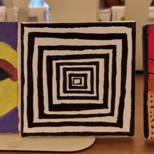 Square canvas with concentric black squares on a white background.