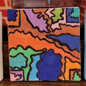 Abstract colorful painting with irregular shapes in orange, blue, green, pink, and purple, outlined in black.