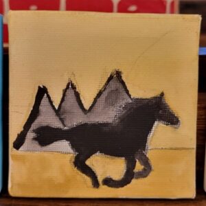 A painting of a black silhouetted horse in front of gray triangular mountains on a yellow-brown canvas.