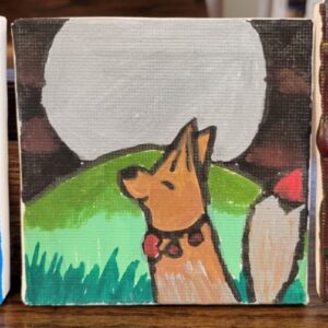 A painted fox sits in a grassy field under a full moon on a canvas