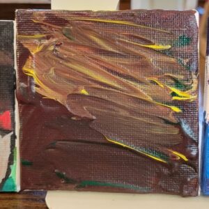Abstract painting with brown, yellow, and green swirling brushstrokes on a small canvas.