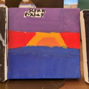 A colorful painting of a sunset over water with a purple sky, red horizon, orange sun, and blue water.