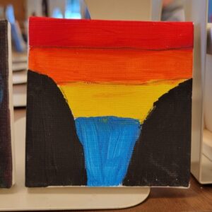 Small abstract painting with a red, orange, and yellow sky over a blue waterfall and black cliffs.