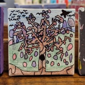 Canvas painting of a stylized tree with pink and purple elements, set against a gradient sky and distant shapes.