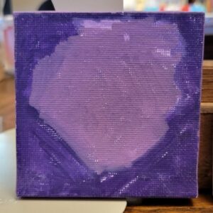Small square canvas painting with gradient purple hues, featuring a central light purple shape surrounded by darker purple edges.