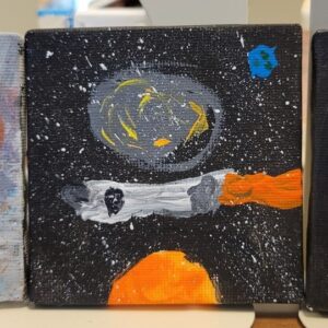 Abstract space scene with swirling celestial objects and speckled stars.