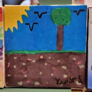 A colorful painting of a landscape with a sun, birds, a tree, and soil.