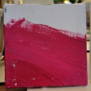 Small square canvas with white and red paint, displaying a gradient effect.